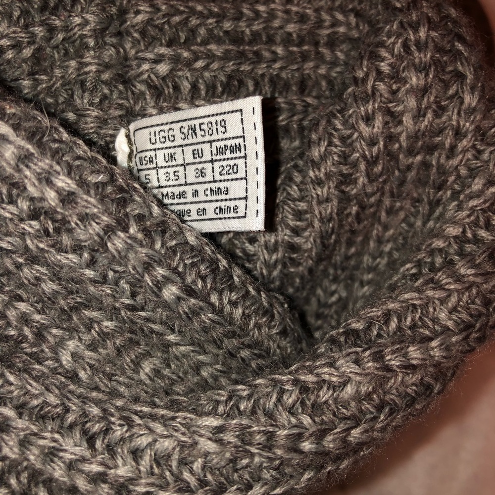 Grey Ugg sweater boots.